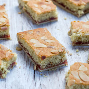 Almond Slice recipe, delicious traybake with a pastry base, jam layer and almond sponge top.