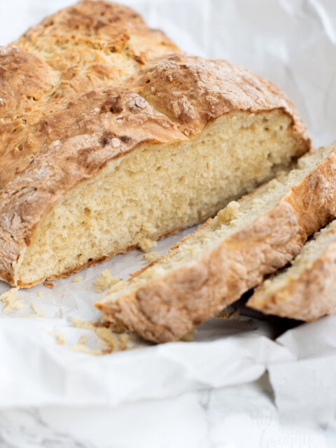 Slice Irish soda bread.