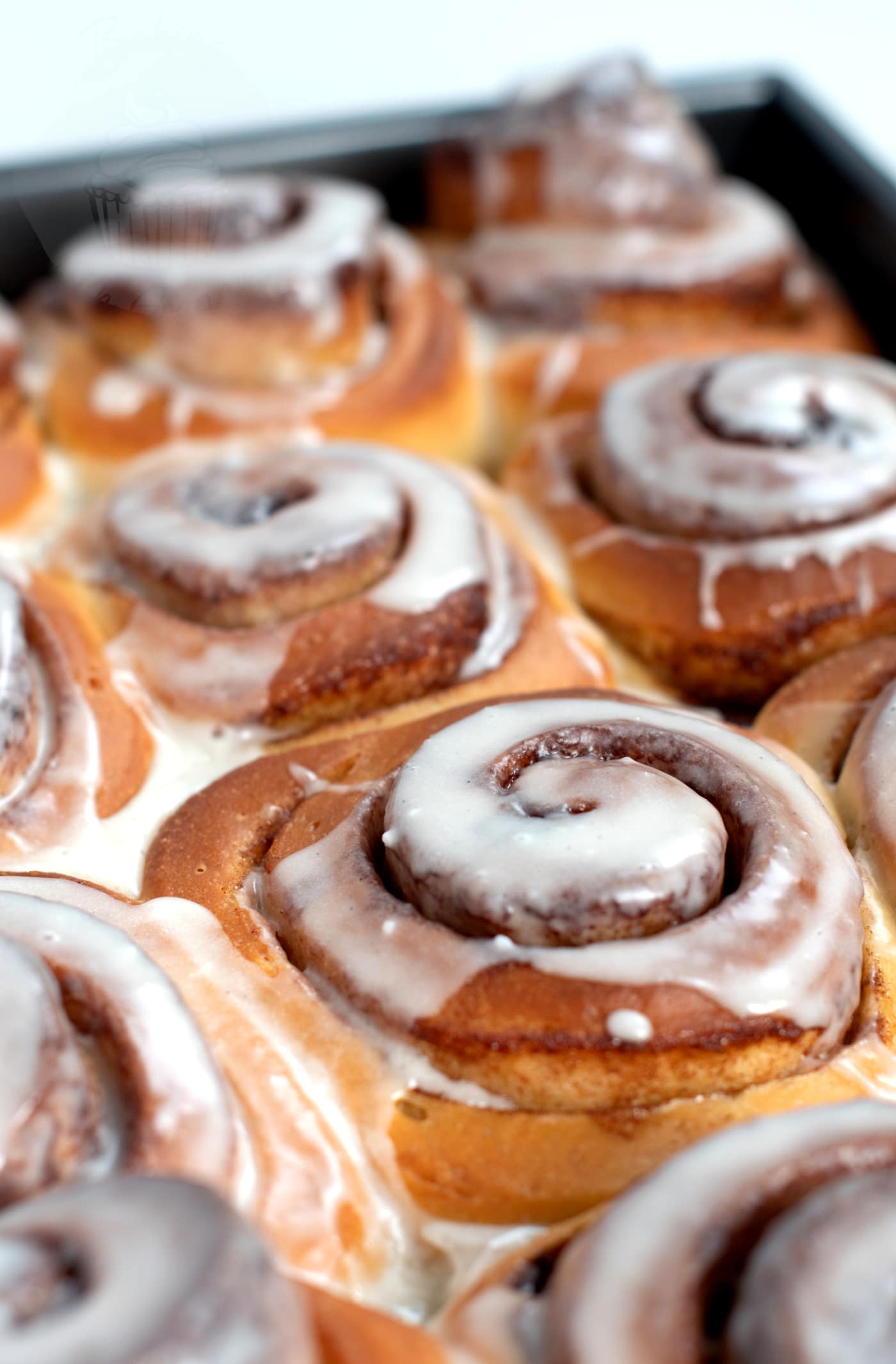 Soft, doughy Cinnamon Rolls, filled with sweet cinnamon and topped with sticky icing.